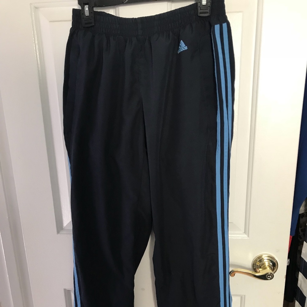 Black and Tar Heel blue Adidas sweat pants